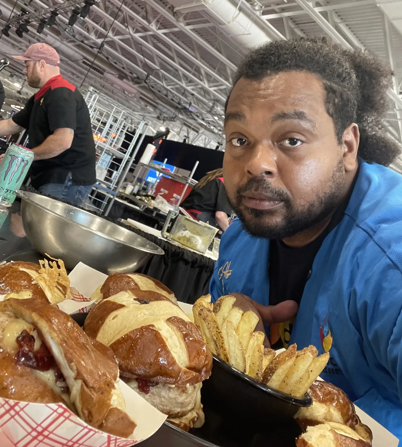 Chef Bryan Morales (The Avocado Yojimbo) proudly presents his Turducken Burger entry at the World Food Championships (WFC).