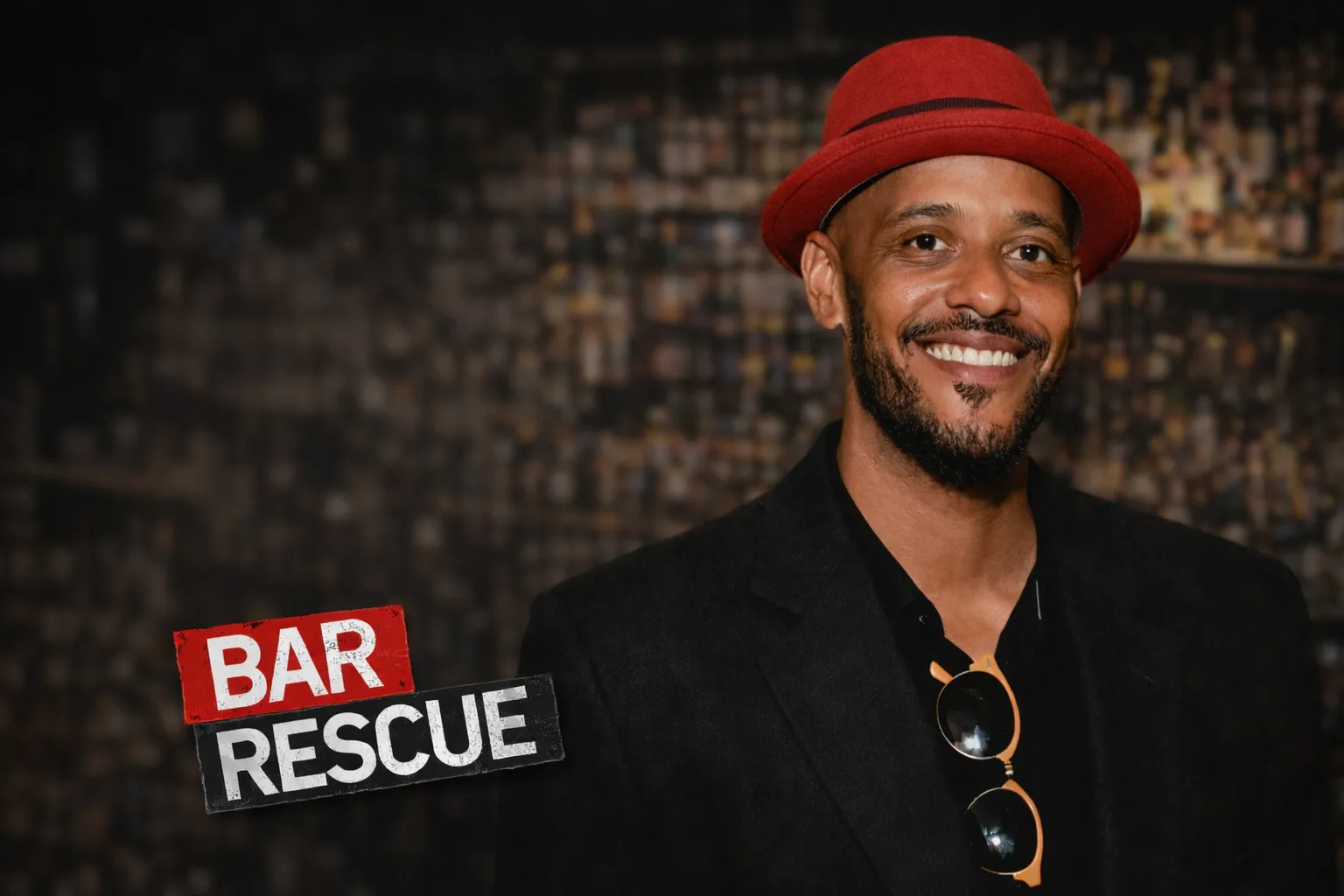 Portrait of Bar Rescue Co-Host Phil Wills wearing his signature red hat, featuring the Bar Rescue logo. Exclusive interview for 86'd Me on the Art of Hospitality.