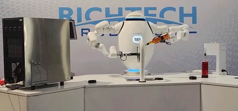 RICHTECH Robotics automated bartender arm pouring a cocktail at the 2026 Bar and Restaurant Expo.