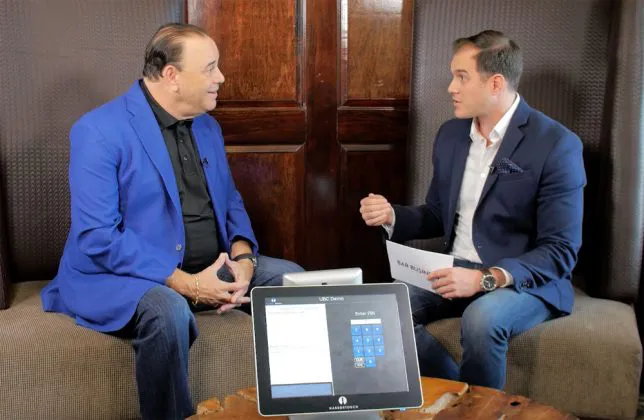Jon Taffer and Art Sutley sitting together and talking.